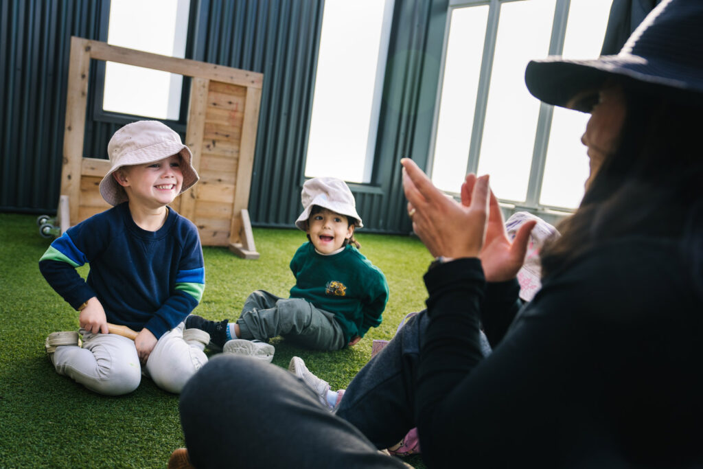 KU Maidstone childcare educator interacting with children