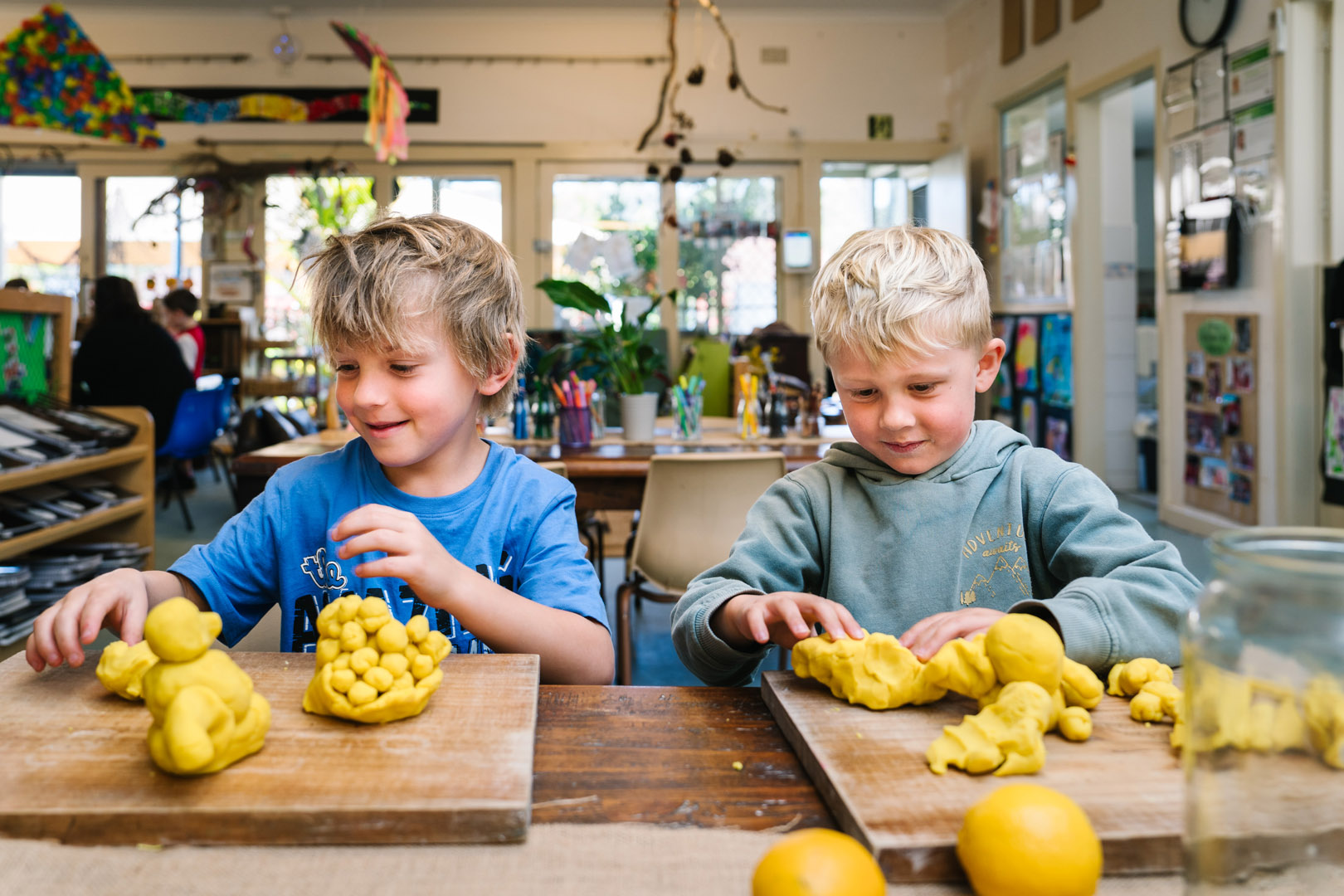 Children sculpting with playdough at KU Bel Air childcare