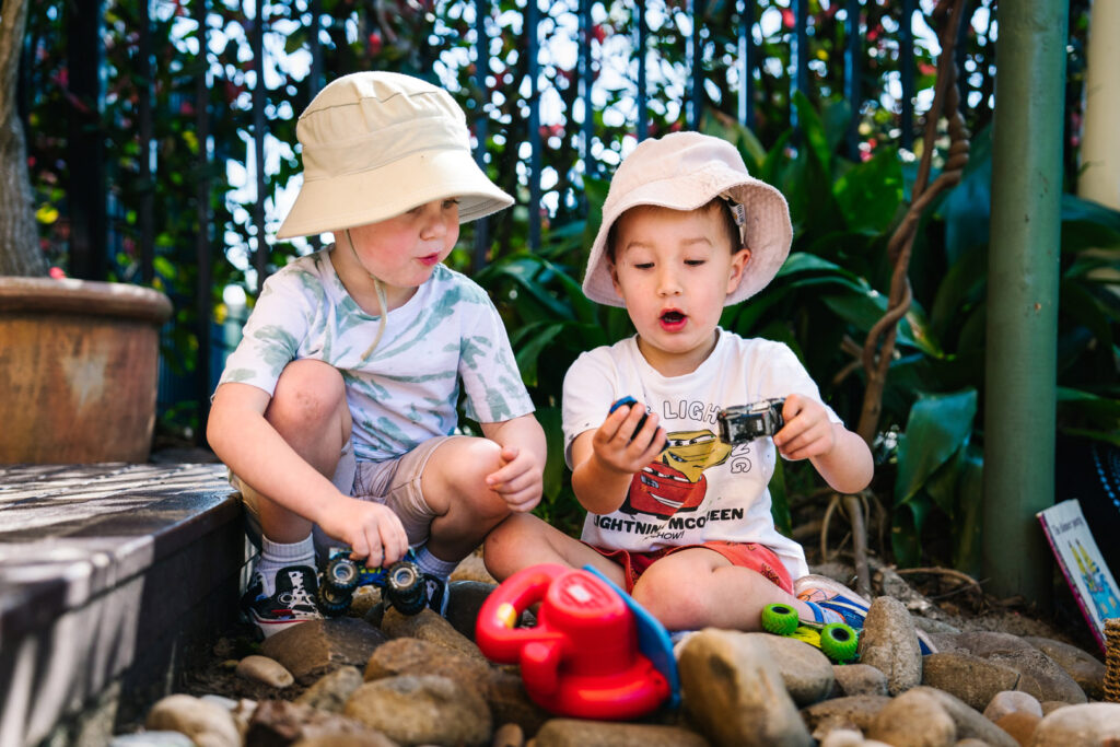 Children playing with toy cars at KU Bel Air childcare