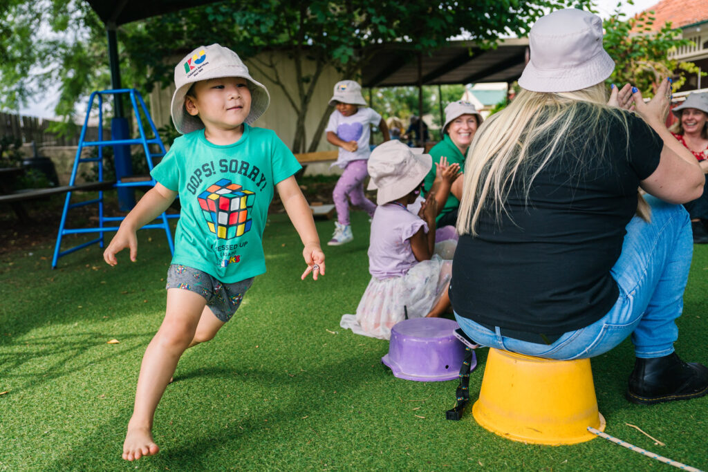 Children running at KU Briar Cottage childcare