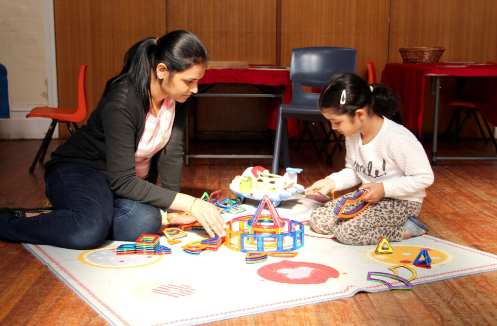 KU IWSP Burwood childcare educator interacting with a child