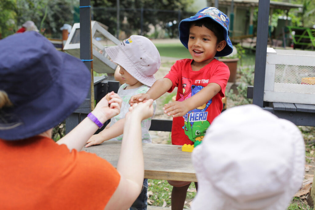 Kooinda Workbase Childcare educator interacting with a child