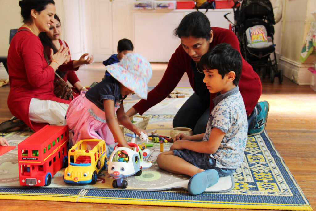 KU IWSP Uniting Church childcare educators interacting with children