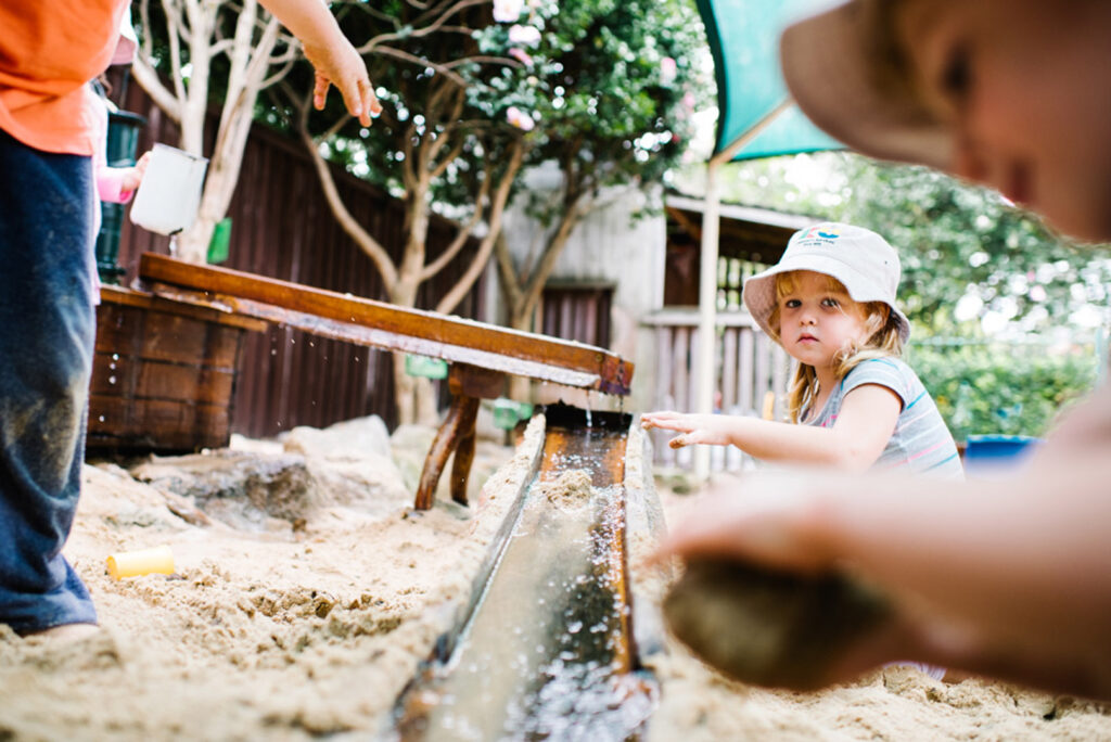 Children playing in the sand at KU Killara Park childcare