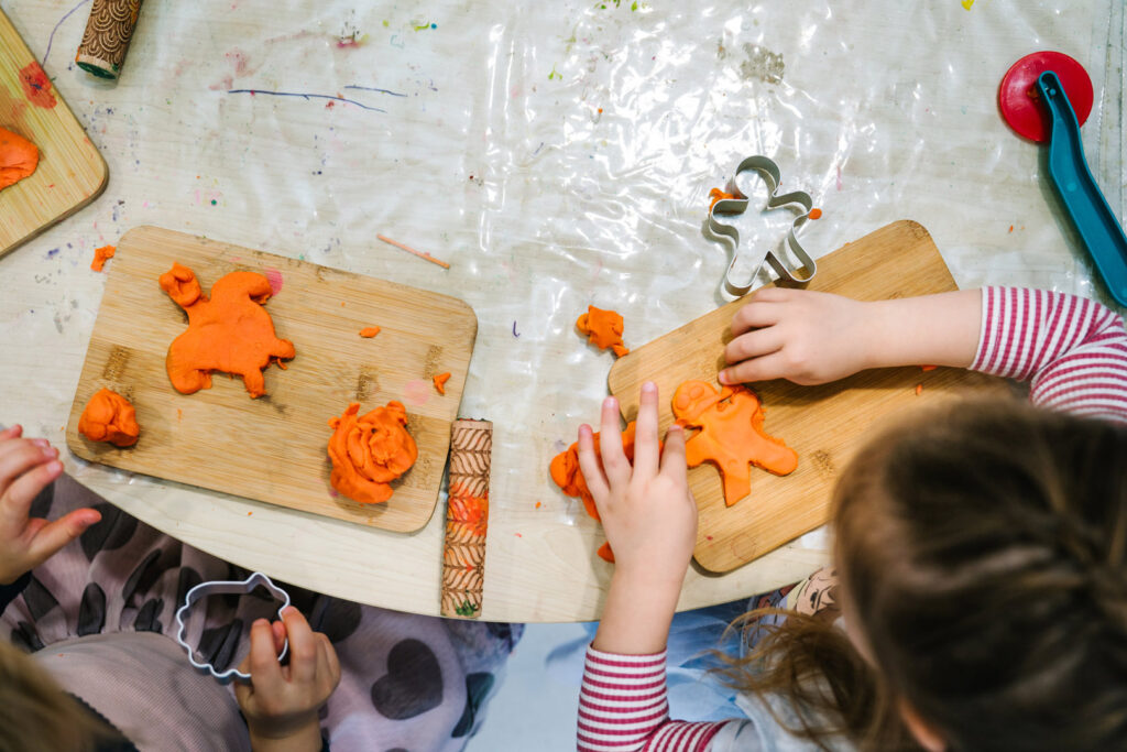 Children sculpting with playdough at KU Peter Pan La Perouse childcare