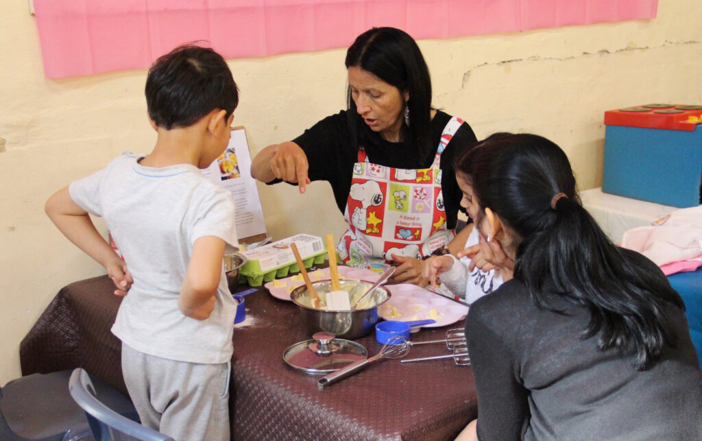 KU IWSP Marrickville childcare educators and children doing some cooking