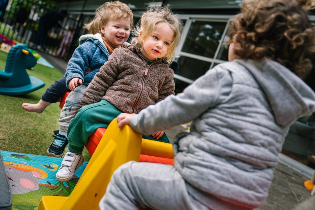 Children on the seesaw at KU's The Joey Club childcare