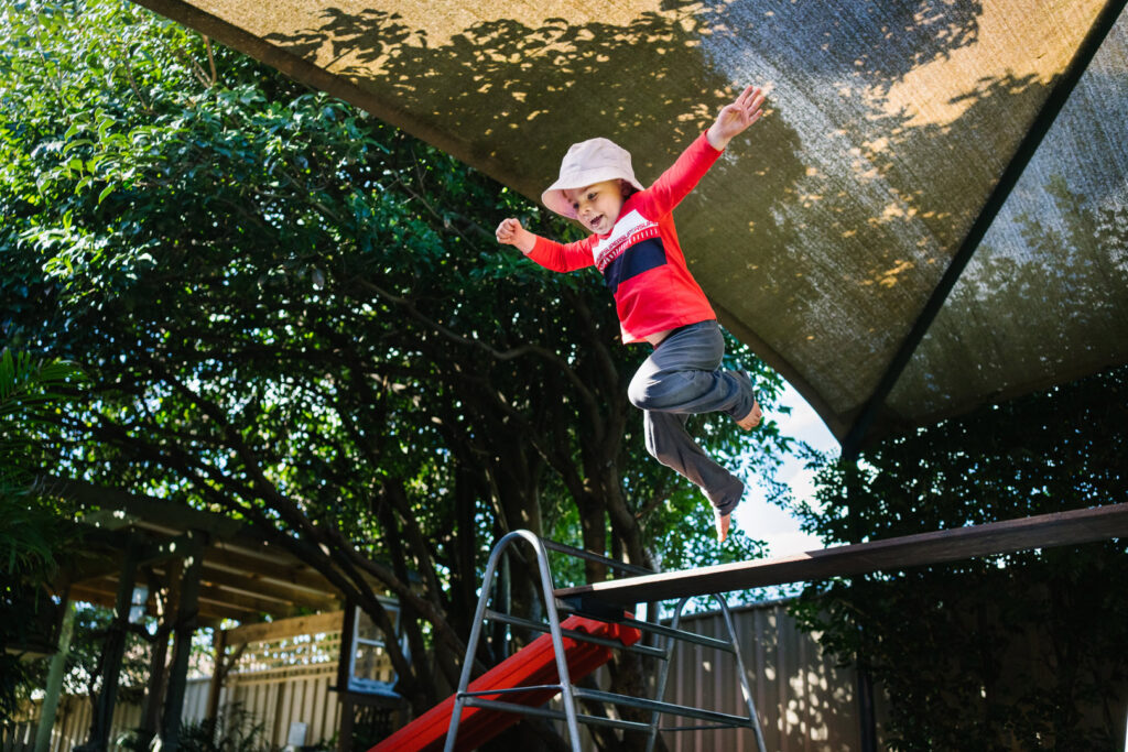 Child on the equipment at KU Mayfield childcare