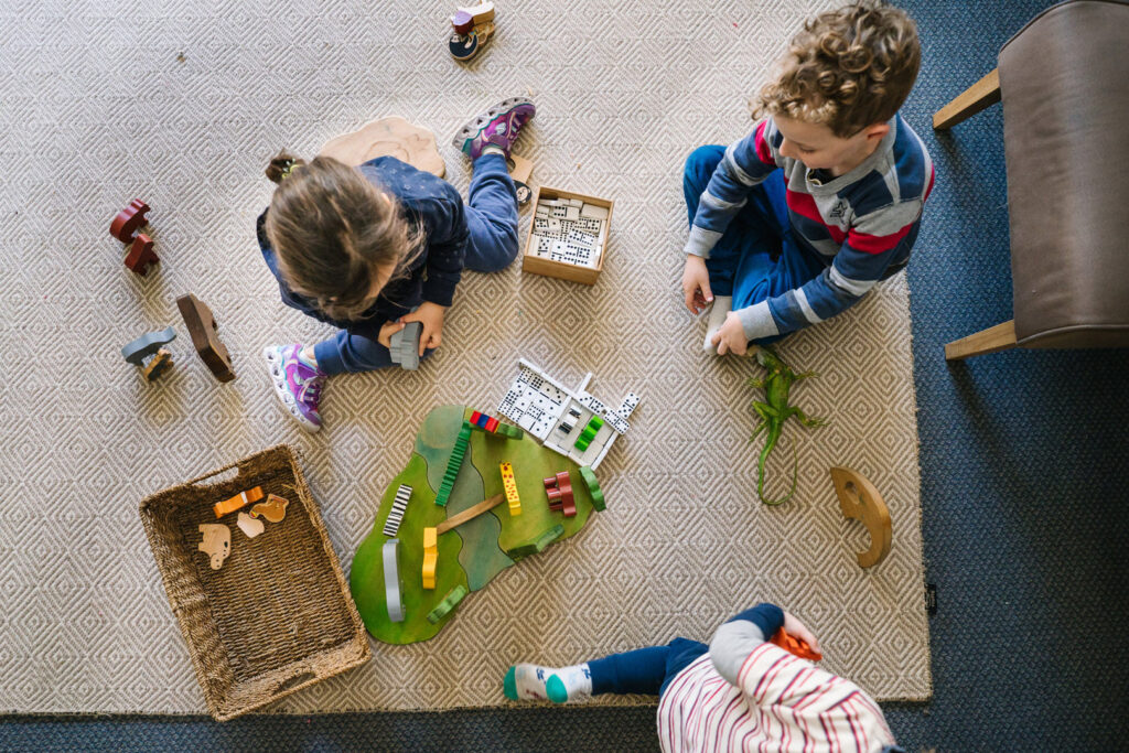 Children playing with a farm set at KU North Ryde childcare