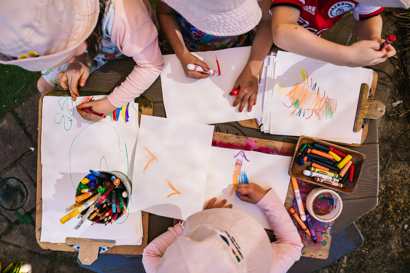 Children doing some drawings at Kira childcare