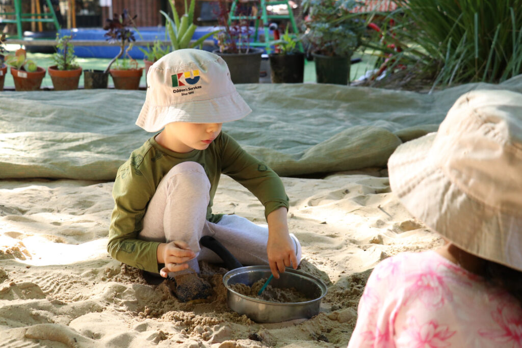 Children playing in the sand at KU Maybanke childcare