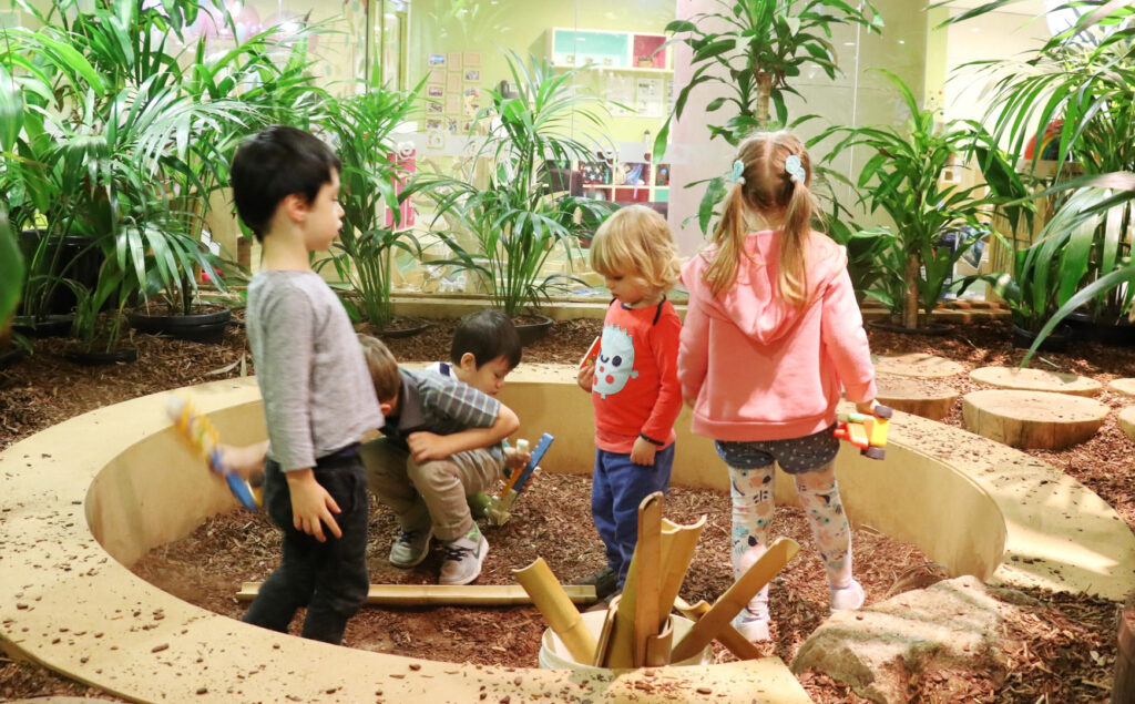 Children interacting at KU's The Tree House childcare