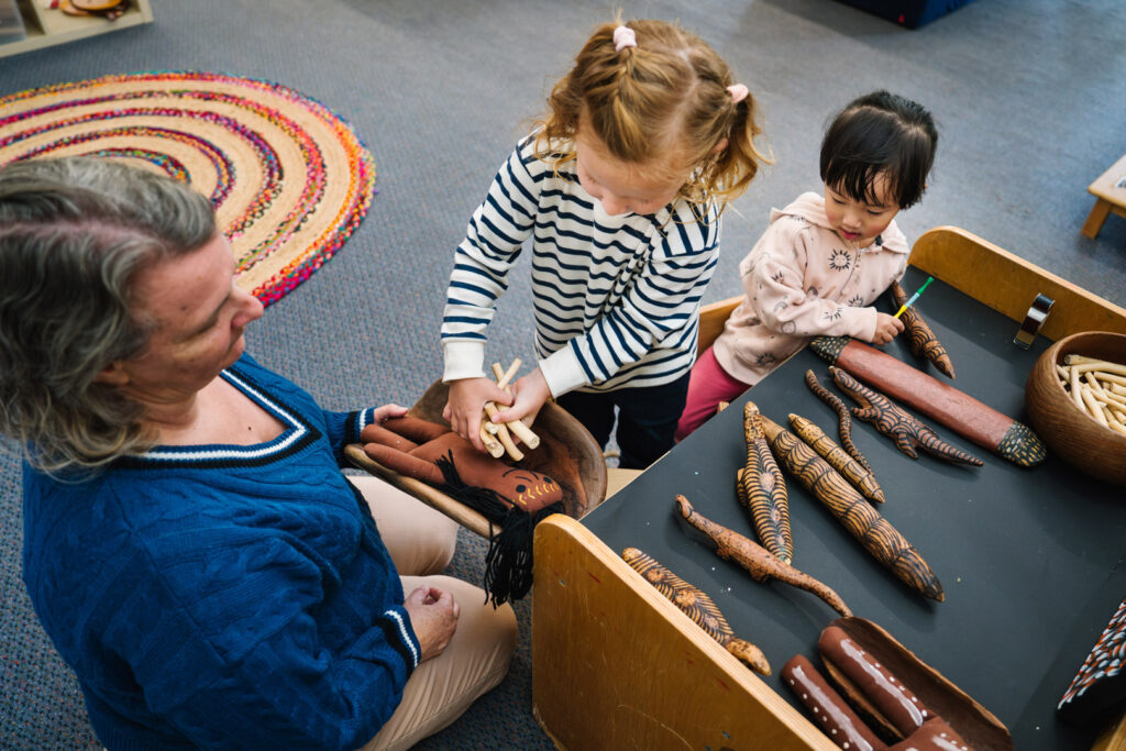 KU James Cahill childcare educator interacting with children